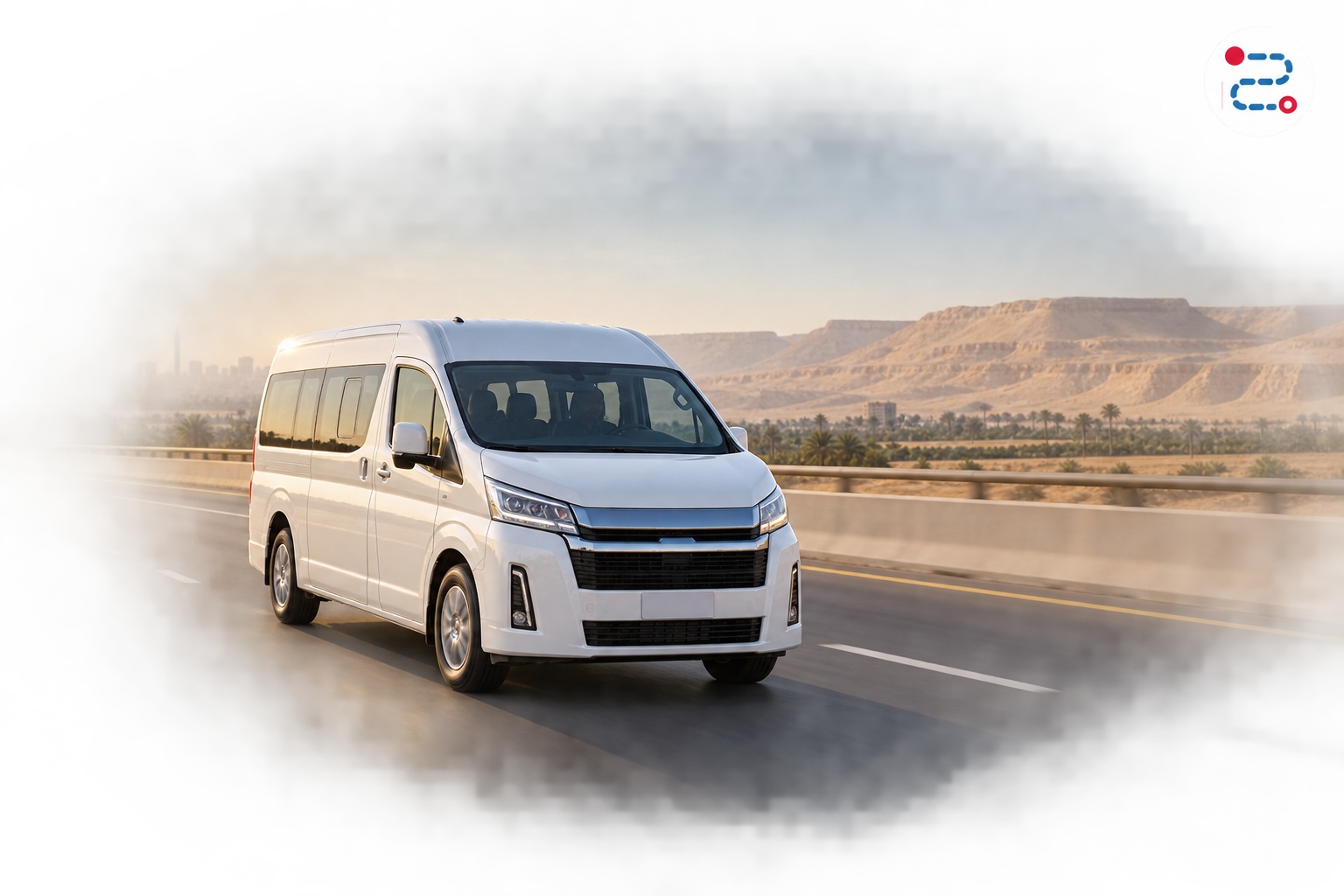 White private minivan travelling on a road in Egypt